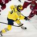Michigan junior right wingman Luke Moffatt shoots in the second period on Saturday. Daniel Brenner I AnnArbor.com